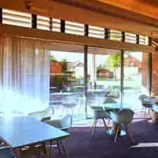 Magdalen Lounge at Hotel Du Vin Exeter, bright meeting space with large windows for events.