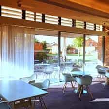 Magdalen Lounge at Hotel Du Vin Exeter, bright meeting space with large windows for events.