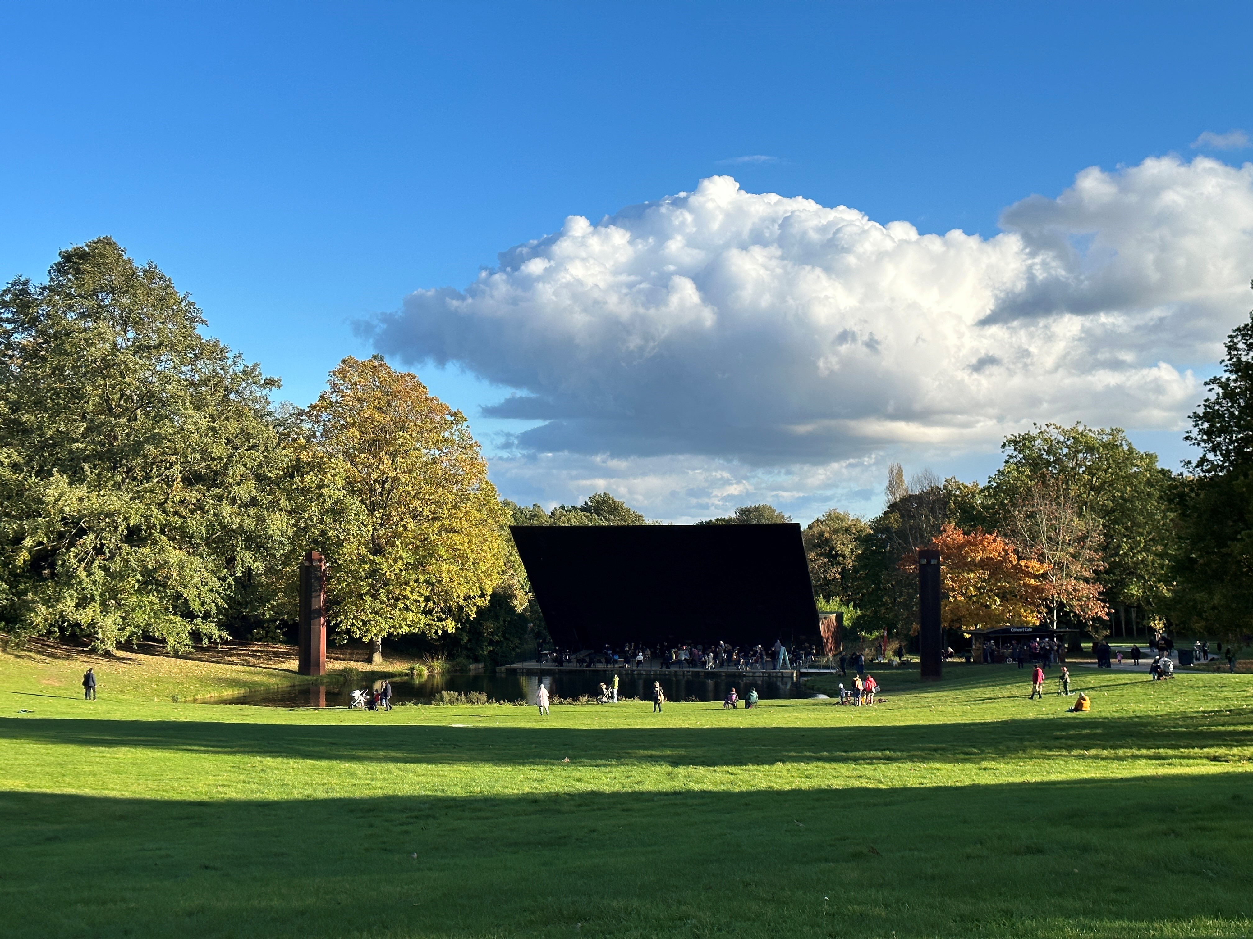Crystal Palace Concert Platform stage in park, ideal for outdoor concerts and gatherings. - Banner