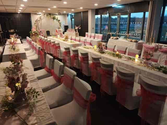 Milburn Lounge event space with elegant pink accents, perfect for weddings and celebrations.