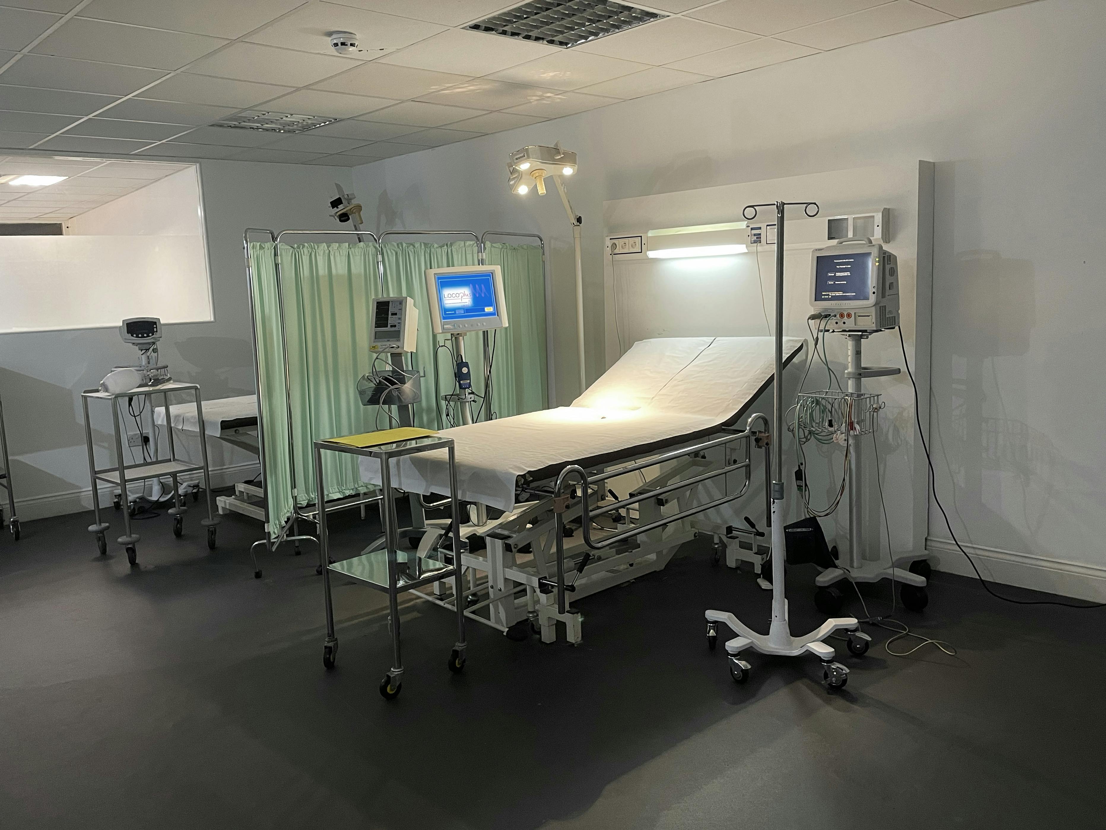 Medical GP hospital room for health events, featuring sterile environment and training sessions.