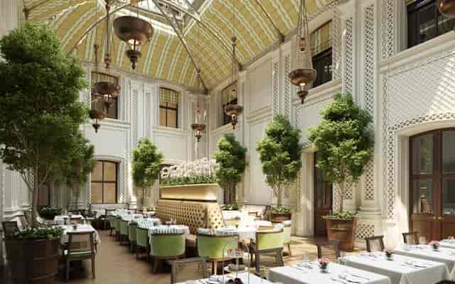 Elegant event space in Raffles OWO with high ceilings, perfect for upscale gatherings.