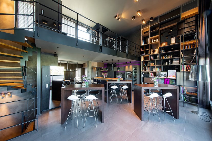 Modern rooftop venue with natural light for intimate gatherings and networking events.