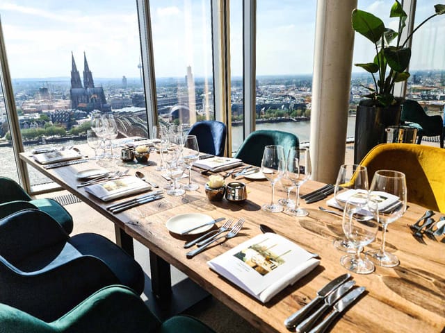 Elegant dining table in modern venue, perfect for upscale events in Koelnsky.