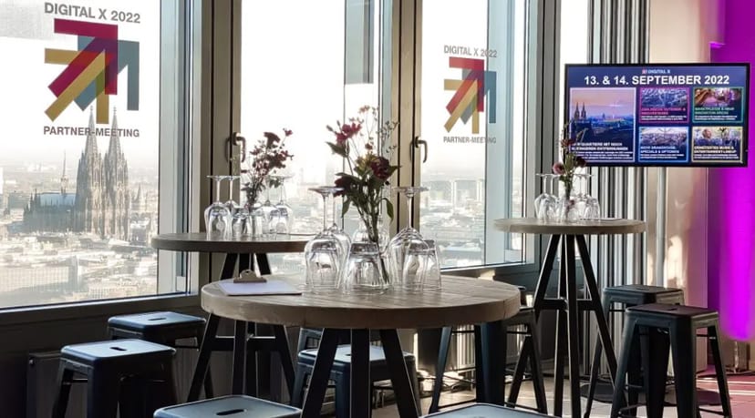 Modern event space with city view, ideal for conferences and networking.