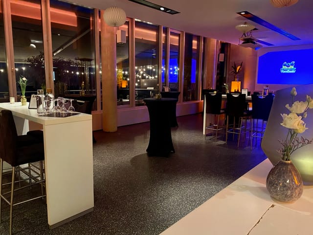 Stylish event space in Pe303 with modern decor for networking and cocktail receptions.