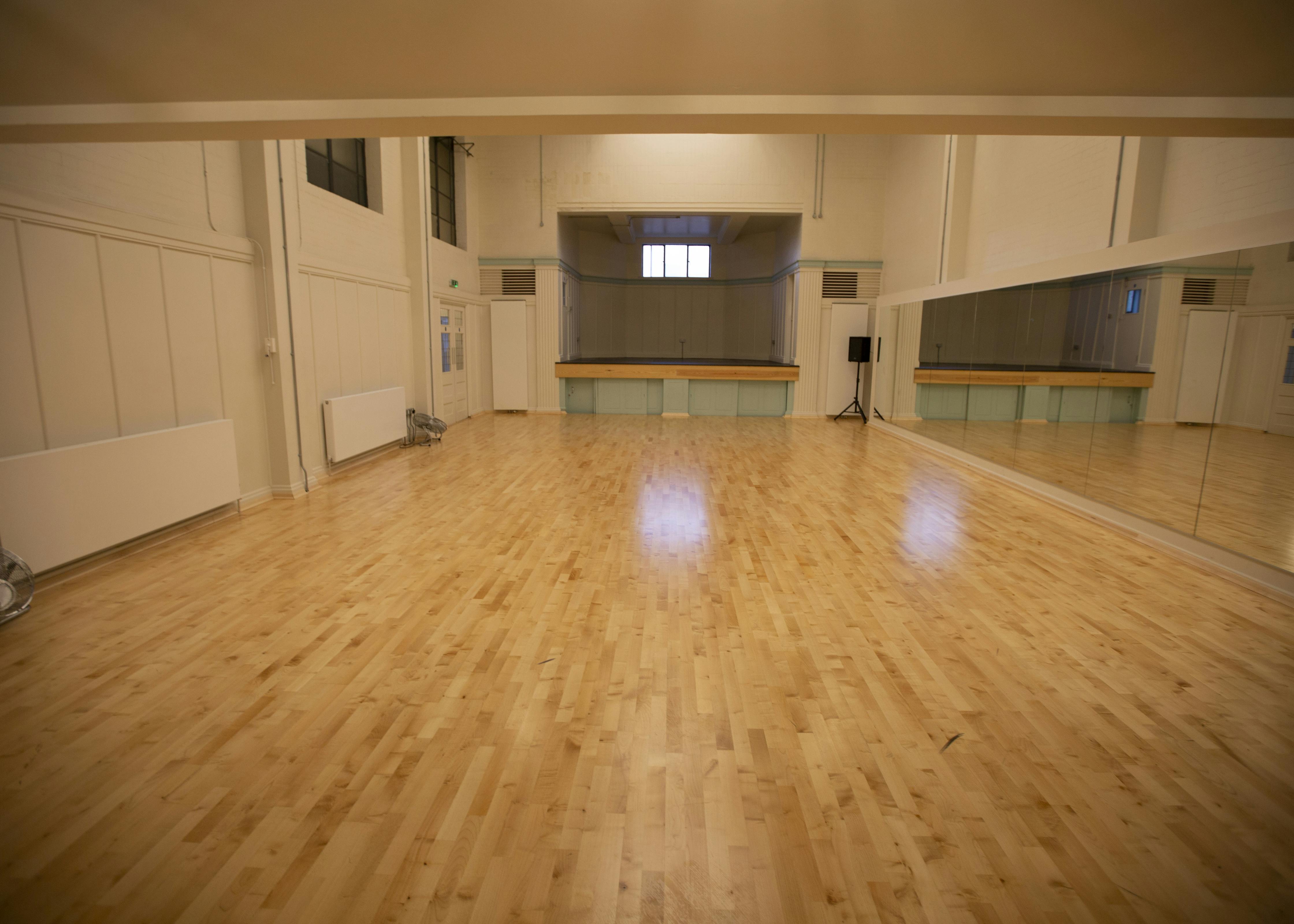 Spacious Studio 1 at International College of Musical Theatre, perfect for workshops and dance classes.