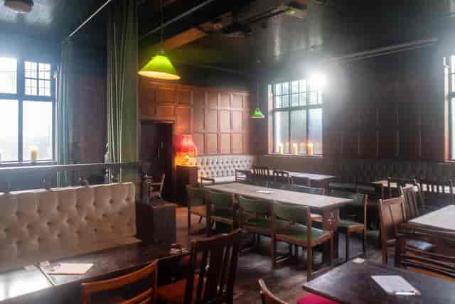 Semi-private event space with cozy booths, ideal for networking and small conferences.