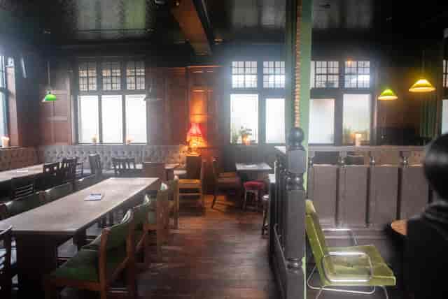 Cozy semi-private area at The Adam & Eve, perfect for intimate meetings and events.