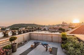 Rooftop venue at Four Seasons Prague, ideal for elegant outdoor events at sunset.