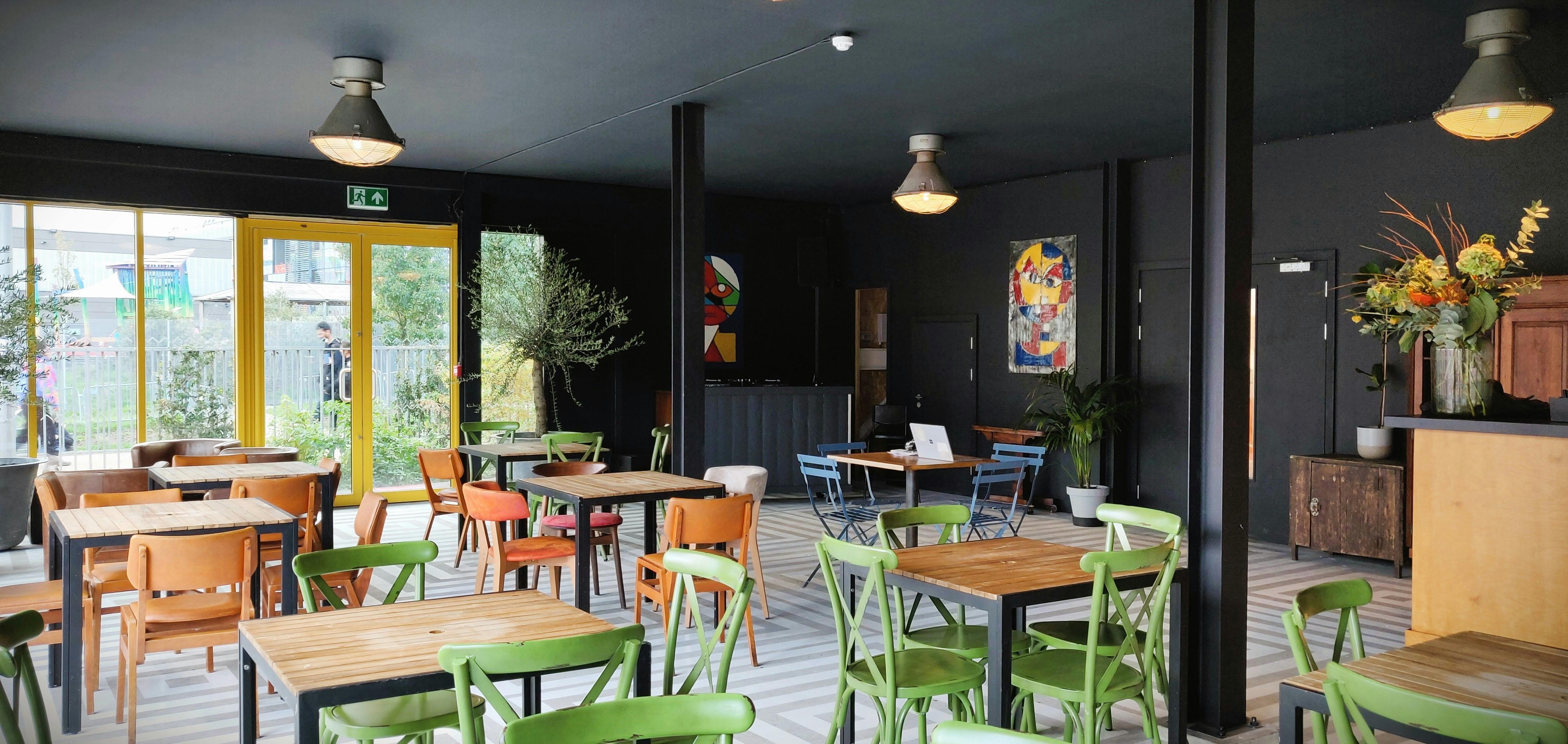Nico's Bar in Hackney Bridge: vibrant event space with colorful decor for networking.