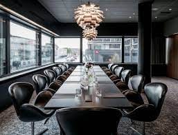 Modern conference room with sleek table and stylish chairs in Radisson Collection Copenhagen.