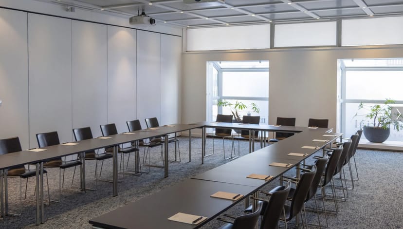 Modern U-shaped meeting room at Imperial Hotel, perfect for workshops and strategic planning.