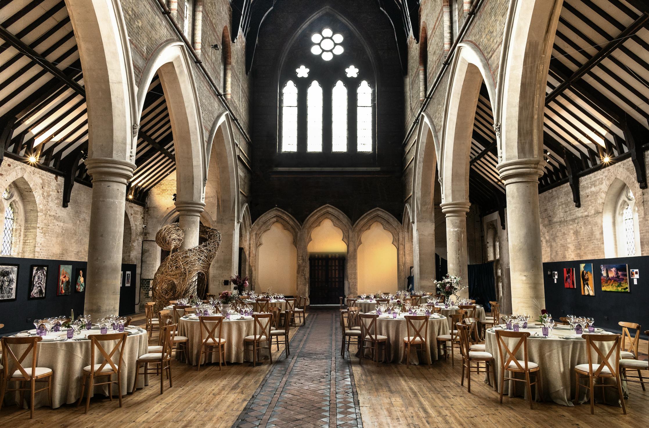 Elegant event space with vaulted ceilings, perfect for weddings and corporate events.