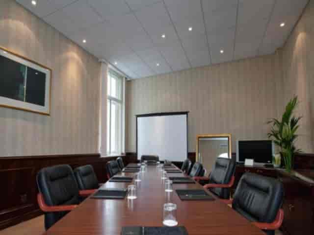 Meeting room at The Bailey's Hotel London with modern decor, ideal for professional events.