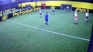 Vibrant Profootball Arena with artificial turf for team-building events and corporate outings.