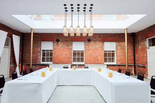 Winstanley House meeting space with U-shaped table, ideal for workshops and planning sessions.