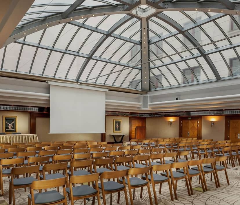 Crystal Ballroom in Alamac X Prague, modern event space with glass ceiling for seminars.