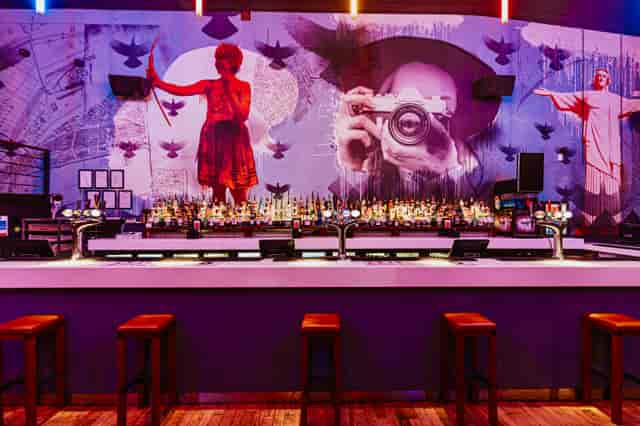 Vibrant Baa Bar venue in Nottingham with artistic mural, ideal for networking events.