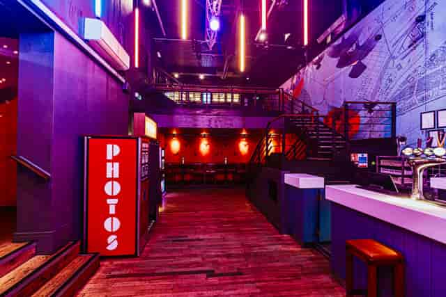 Vibrant event space at Baa Bar Nottingham with modern bar and dynamic lighting.