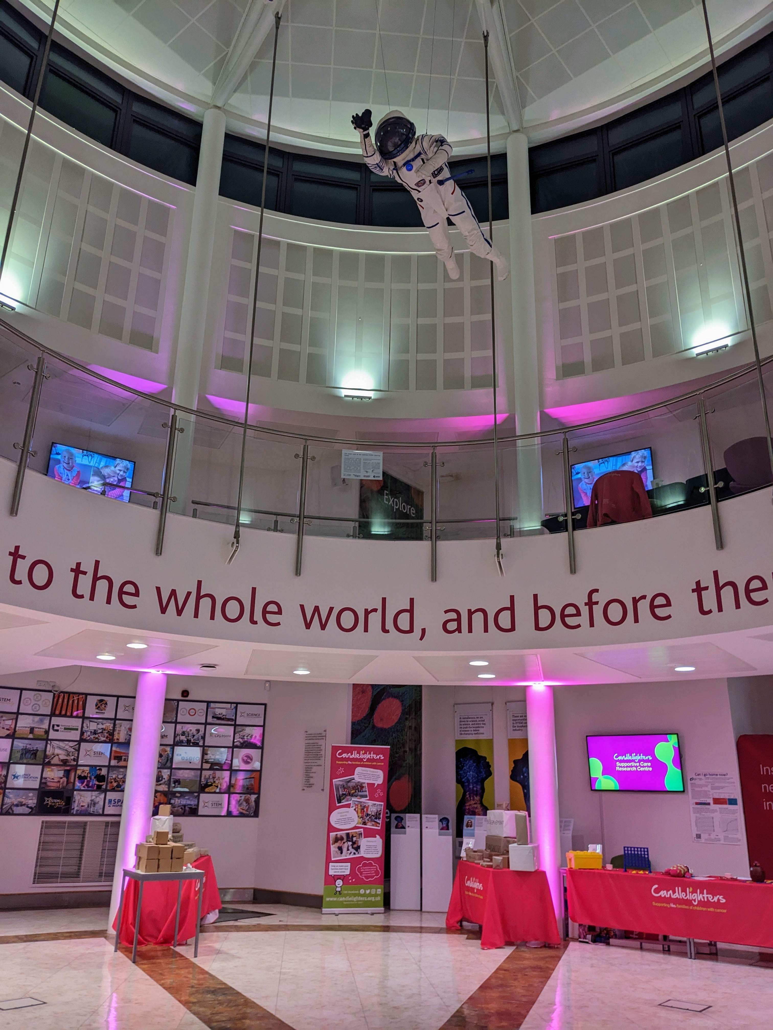 Modern event space in National STEM Learning Centre with pink lighting for conferences. - Banner