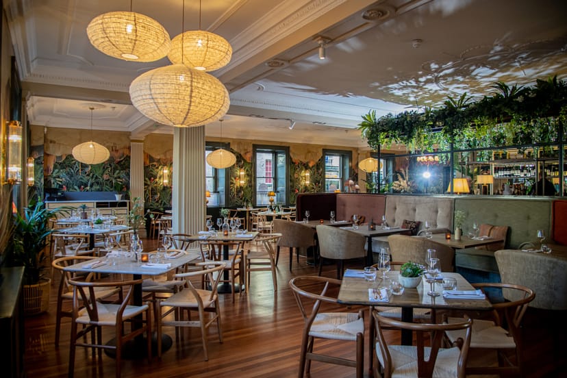 Elegant restaurant space with warm lighting, perfect for gatherings and corporate events.