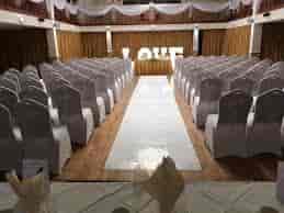 Trafalgar Ballroom at Royal Maritime Hotel, elegant wedding venue with "LOVE" display.