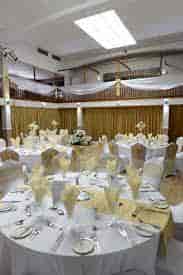 Trafalgar Ballroom at Royal Maritime Hotel, elegant wedding banquet with floral centerpieces.