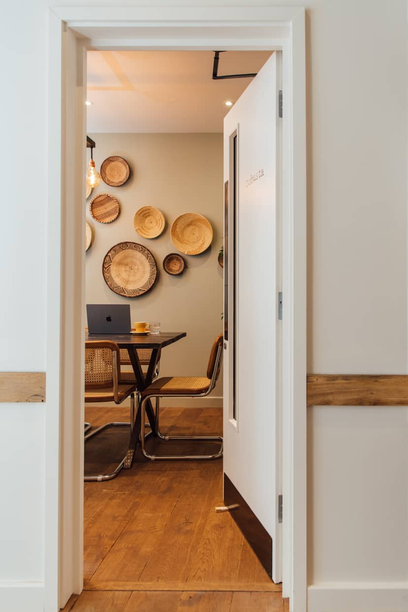 Cozy meeting space at Hermitage Rd Coffee & Bagel Bar for team gatherings and workshops.