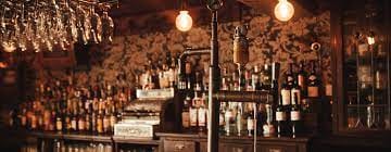 Stylish bar setup with vintage decor, perfect for networking events and cocktail receptions.