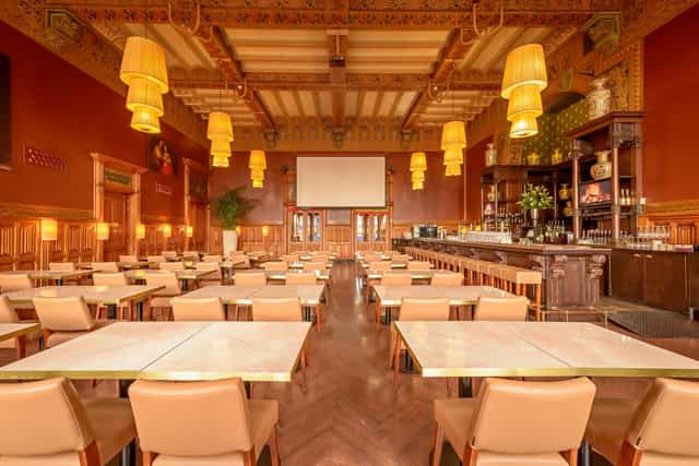 Elegant 1st Class Waiting Room with ample seating, ideal for meetings and social events.