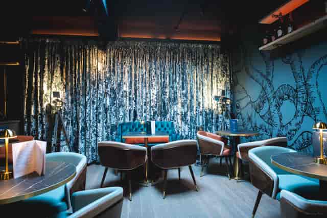 Elegant venue with plush seating for intimate meetings and events.