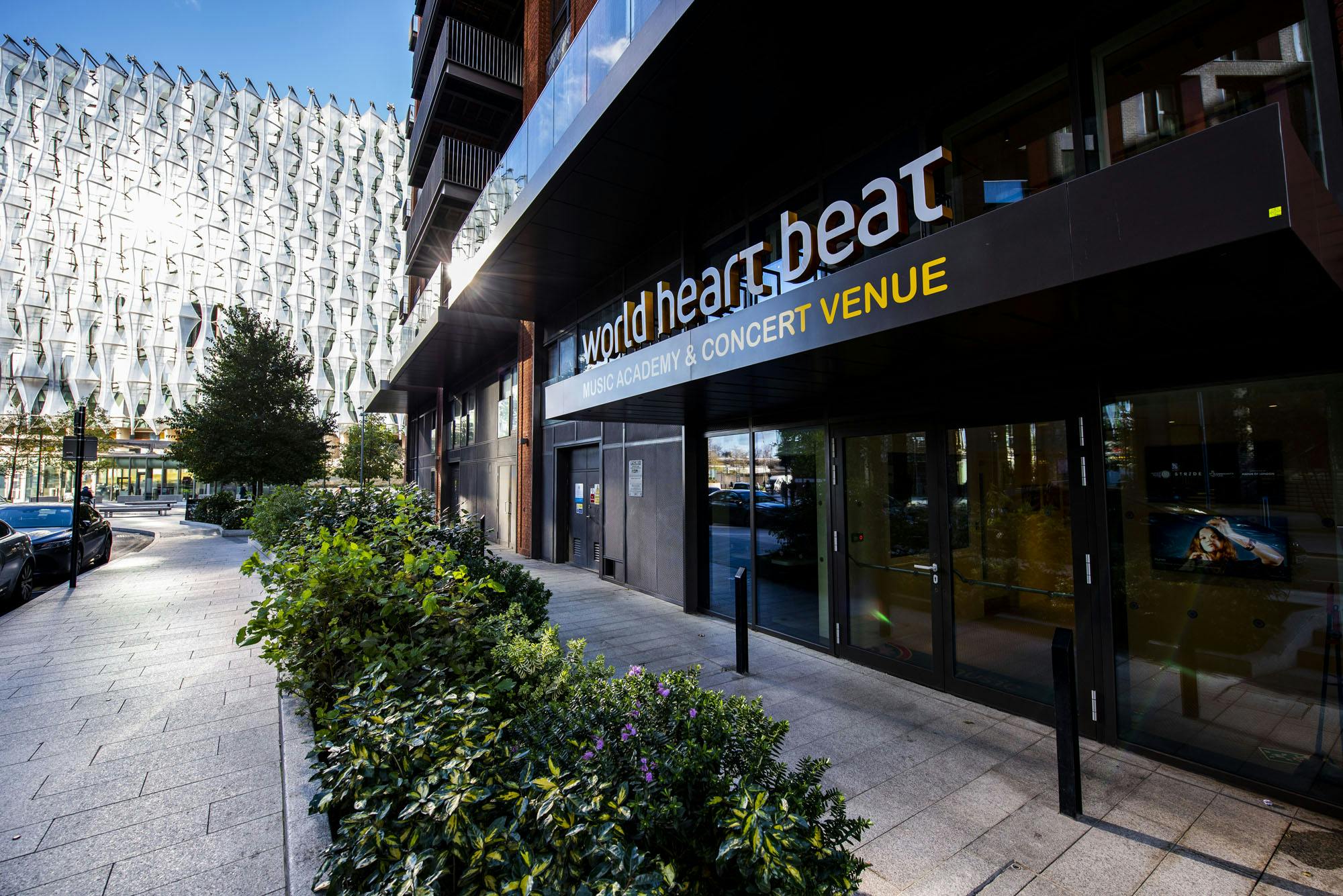 Modern auditorium at World Heart Beat Embassy Gardens, ideal for meetings and concerts.