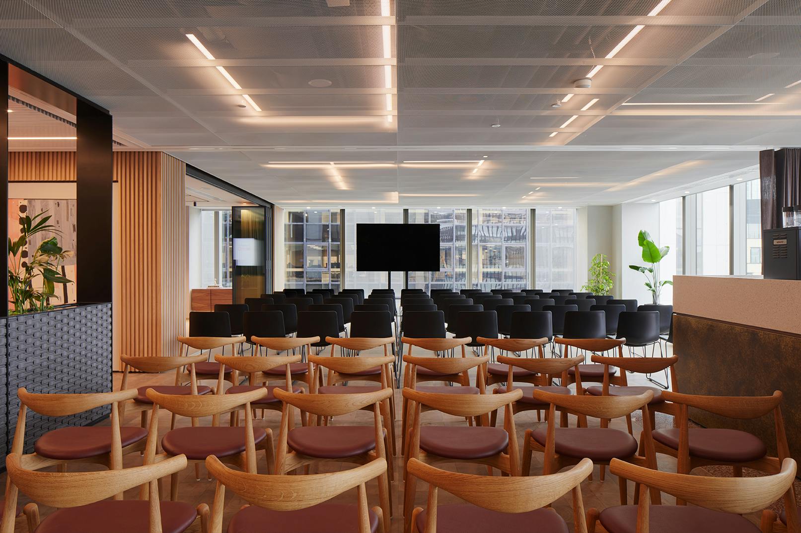 Modern event space in Myo Liverpool Street with stylish chairs for meetings and workshops.