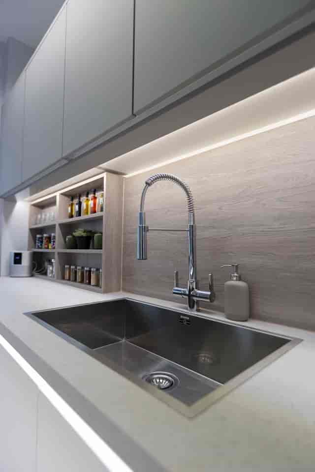 Modern kitchen setup with sleek faucet, ideal for events and catering.