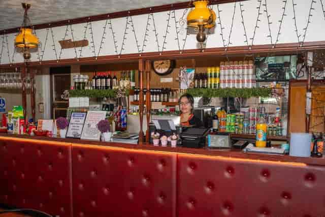 Churchill Hotel bar area with warm lighting, perfect for events and celebrations.