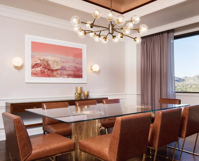 Modern meeting room at The Camby with glass table, ideal for collaboration events.