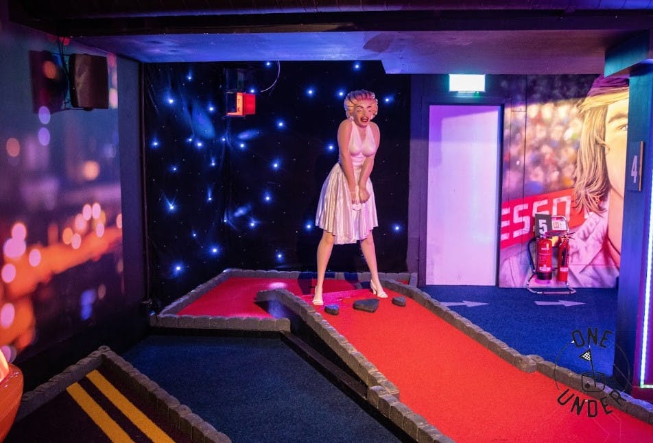 Vibrant mini-golf setup at GlasVegas, perfect for team-building and social events.