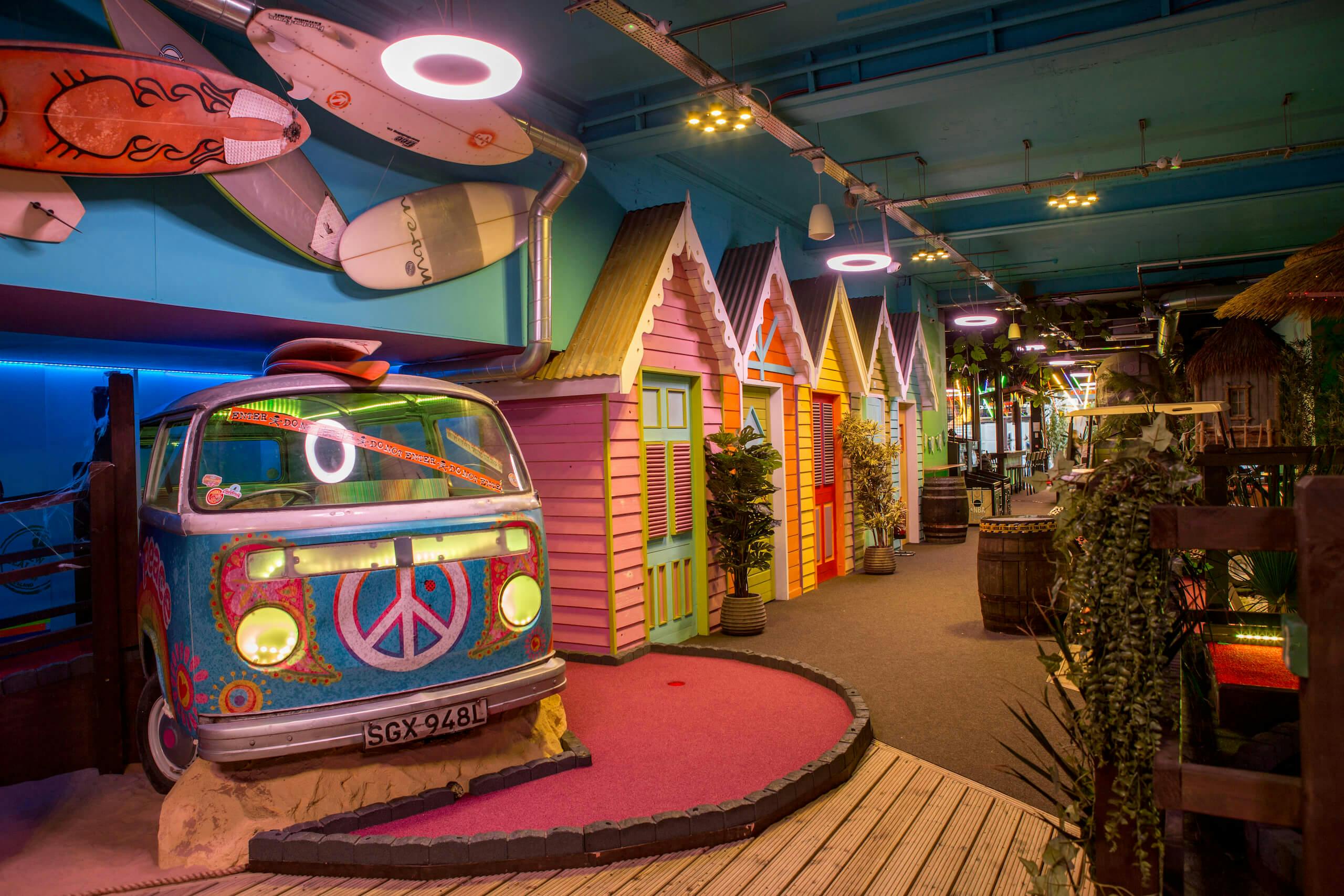 Surfers Paradise at Jungle Rumble Glasgow, featuring colorful surfboards for themed events.