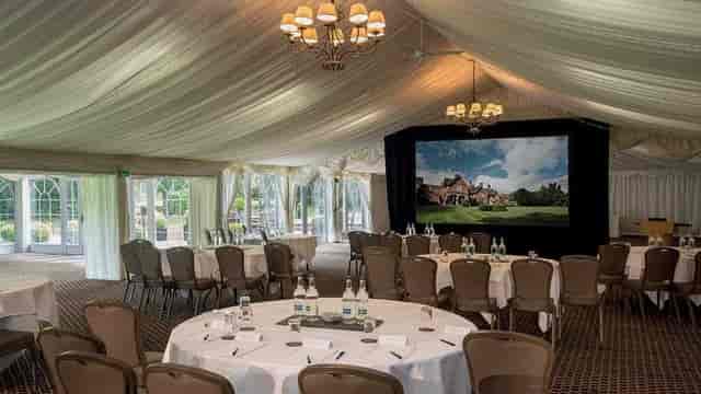 Garden Pavilion marquee set for corporate presentation or upscale event.