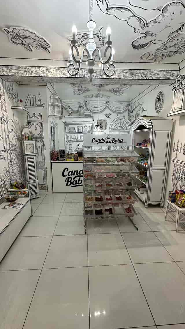 Whimsical candy shop with colorful displays, perfect for events and gatherings.