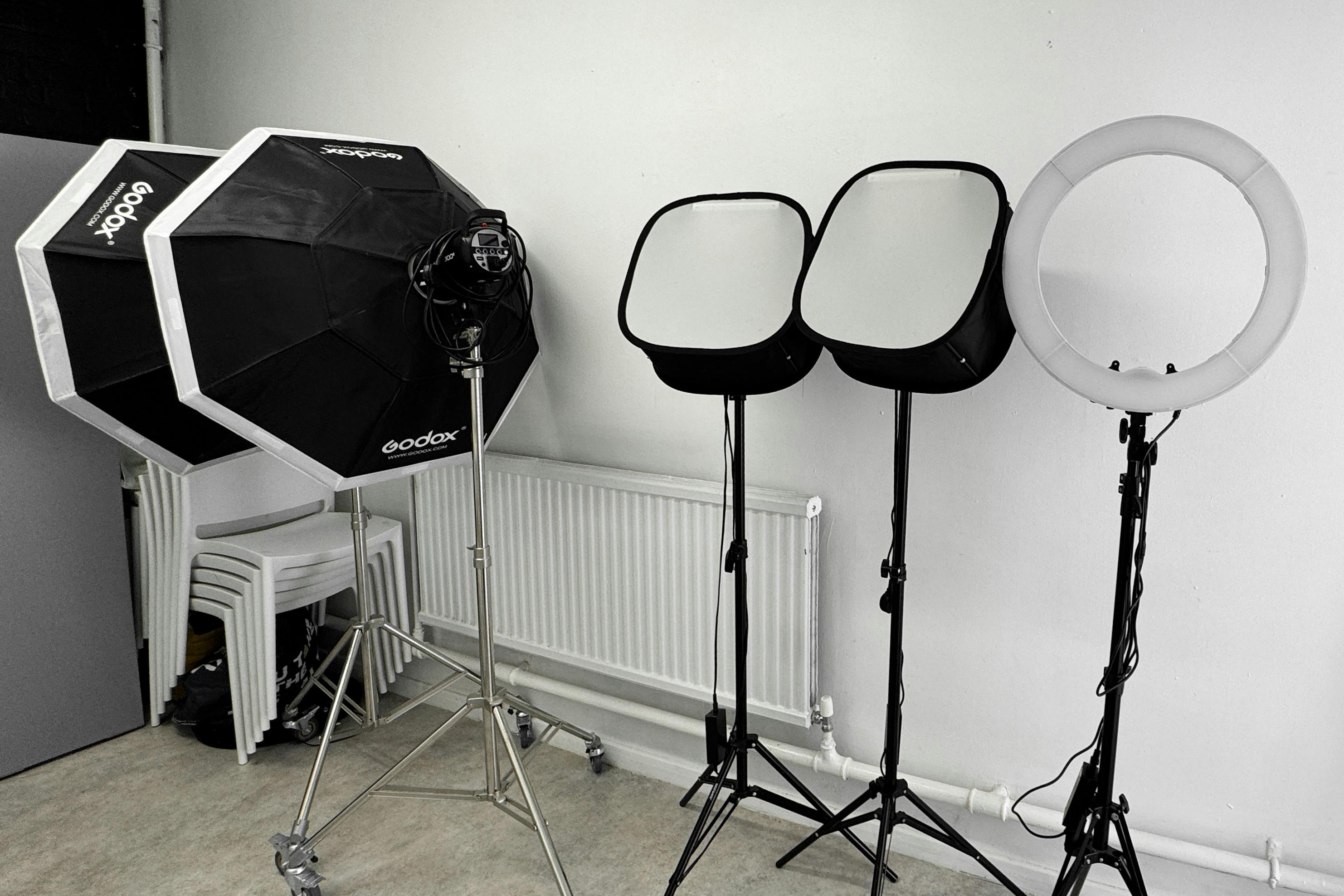 Content Studio with softboxes and ring light for professional event lighting setup.