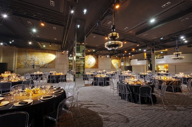 Elegant Vendome event space with black linens, ideal for corporate dinners and upscale celebrations.