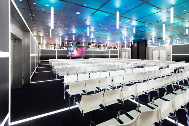 Modern event space in Jaarbeurs with sleek seating for corporate meetings and workshops.