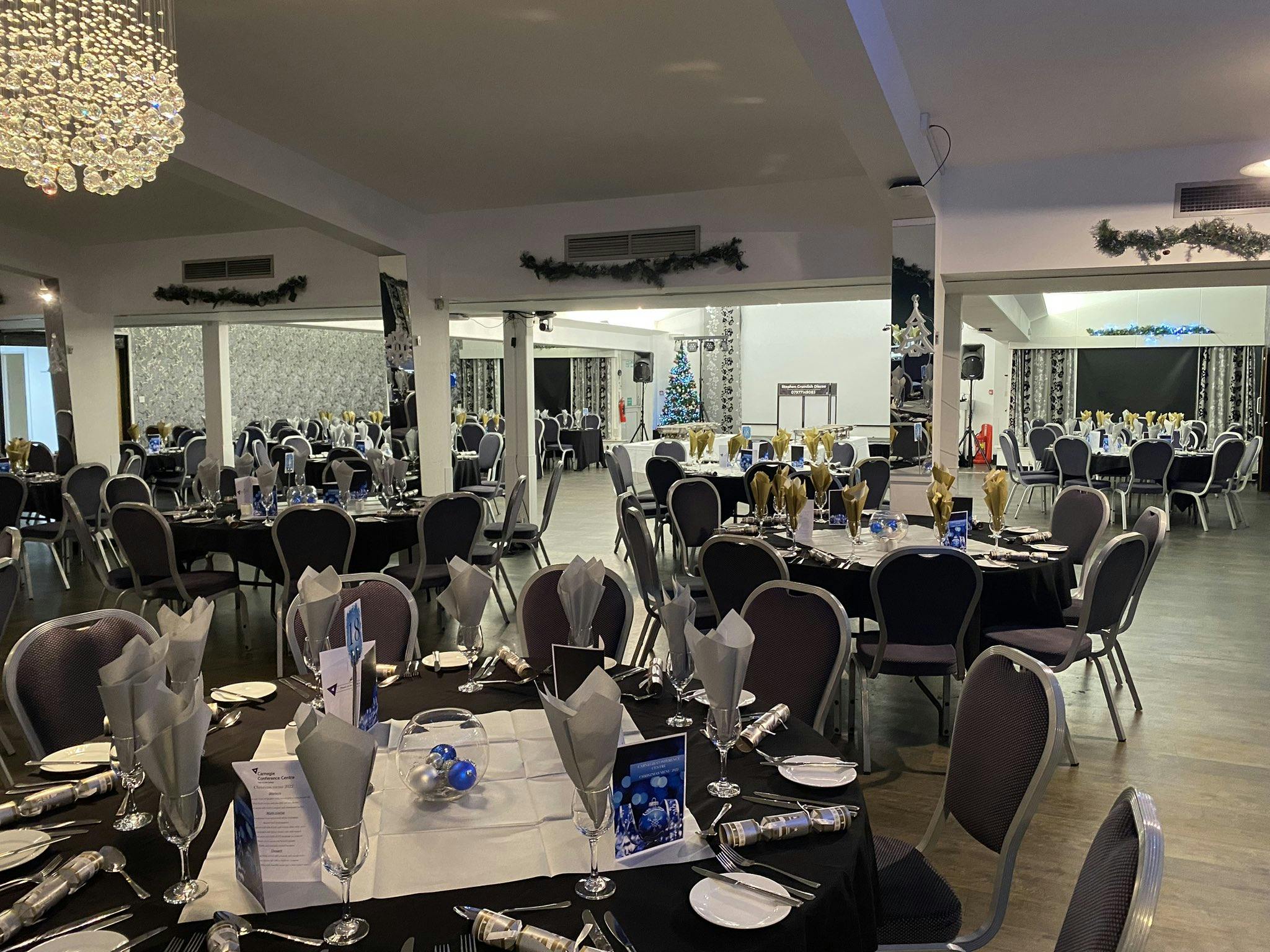 Carnegie Conference Centre event space set for formal banquet with elegant decor.