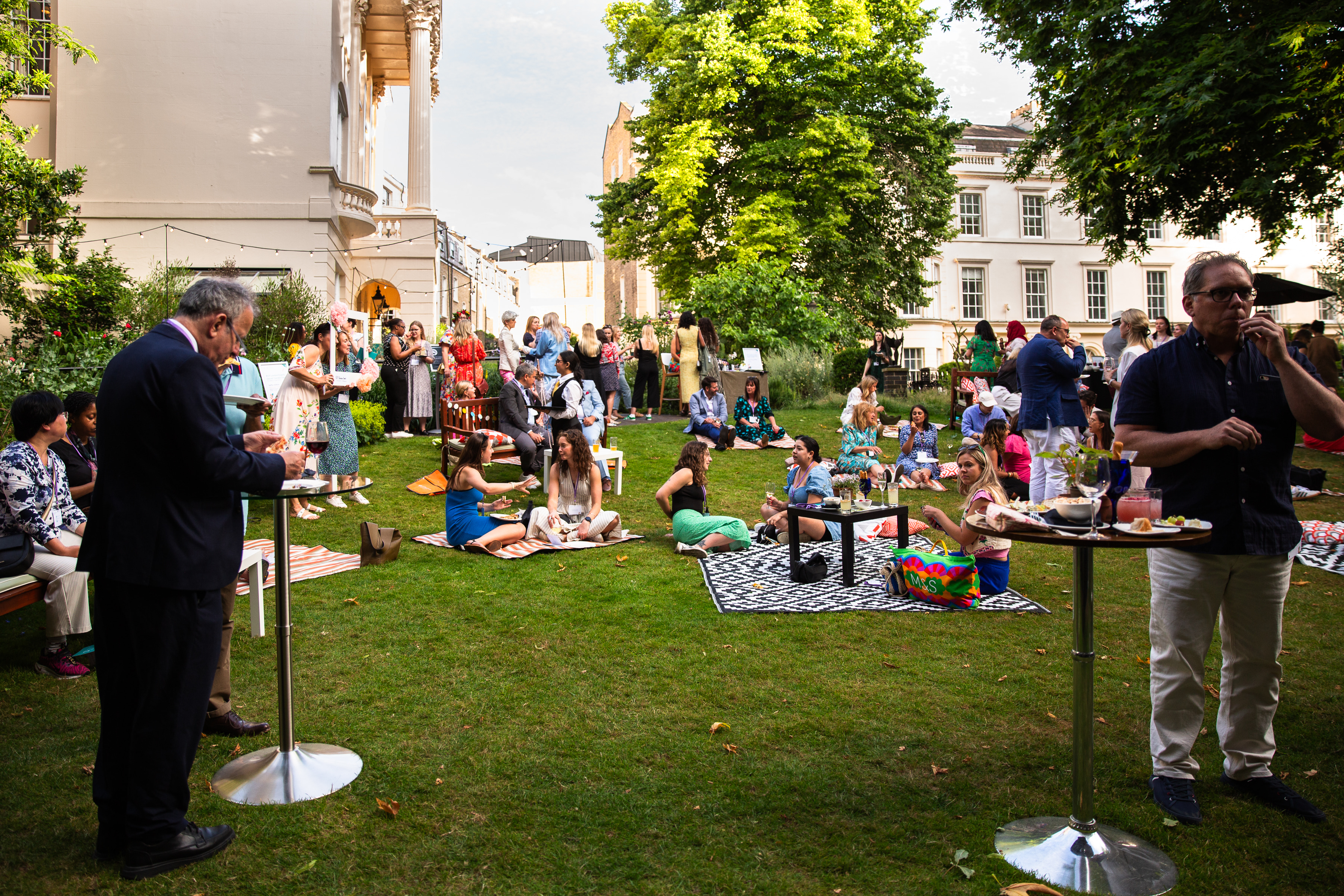Medicinal Garden at RCP London: vibrant outdoor networking event in lush greenery. - Banner