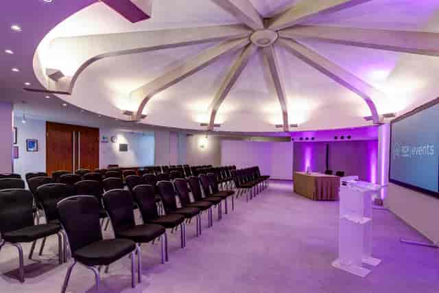 Modern Council Chamber with tiered seating for corporate and creative events in RCP London.