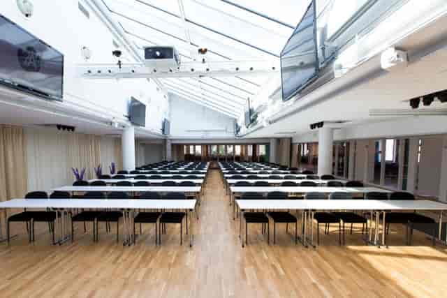 Spacious event space at Loki, Odenplan, ideal for workshops and seminars with natural light.