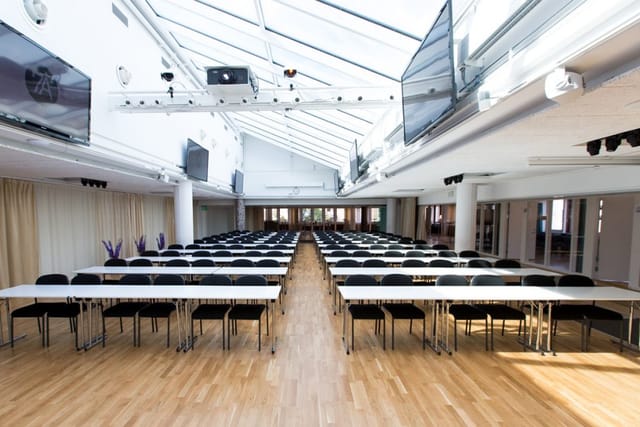 Spacious event space at Loki, Odenplan, ideal for workshops and seminars with natural light.