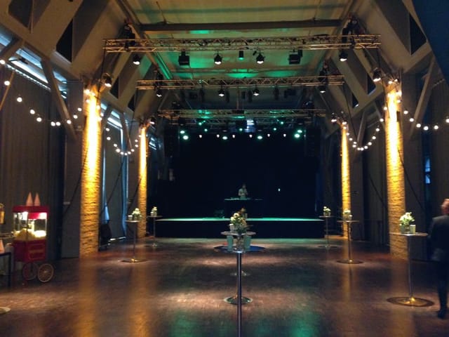 Tram Hall event space in Korjaamo Myynti with elegant decor for corporate gatherings.